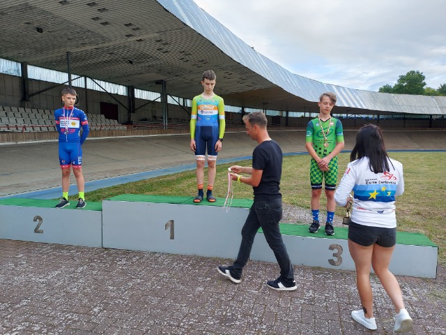 Adam Adamoiwcz na podium