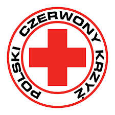 Logo PCK czerowne koło napis czarny Polski Czerwony Krzyż w środku czerwony krzyż